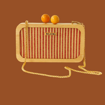 Aira Woodline eco friendly handmade clutch by MaLeeMa, crafted from sustainable natural fibres with minimalist brown texture.