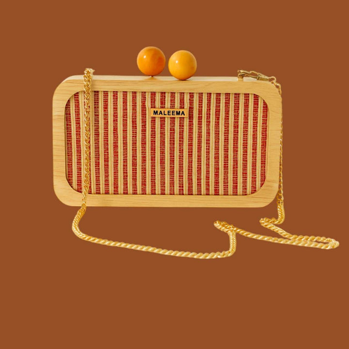 Aira Woodline eco friendly handmade clutch by MaLeeMa, crafted from sustainable natural fibres with minimalist brown texture.