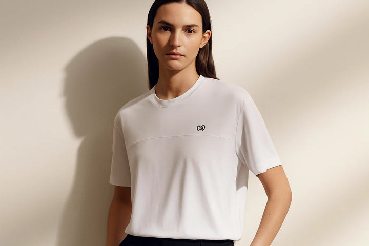 Women’s white block t-shirt made from sustainable plant-based fabric – minimal, soft, and eco-conscious everyday wear