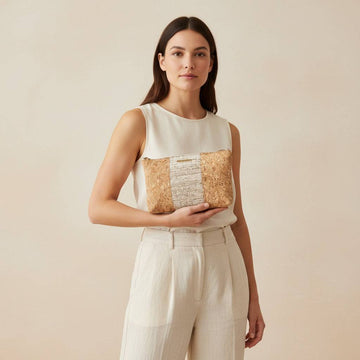 model holding a eco friendly pouch for daily use