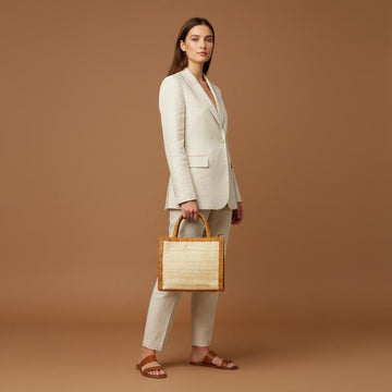 women holding a eco friendly small tote bag 